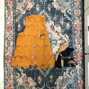 Lace knit sleeveless open back top